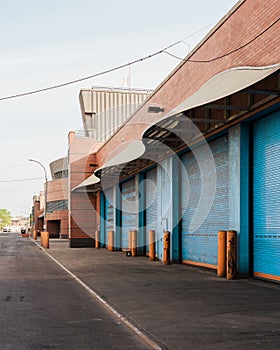 Blue building with garages in East Williamsburg, Brooklyn, New York City photo