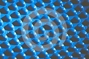 Blue bumpy wet surface abstract