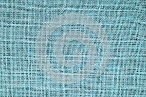 Blue burlap with beautiful canvas texture of blue fabric in retro style with beautiful blue fabric canvas texture as vintage burla photo