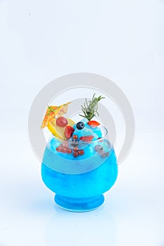 Blue burry and strawberry blue hawaii smoothie. Beverage for summer with whitebackground.