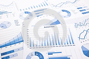 Blue business charts, graphs, reports and paperwork photo