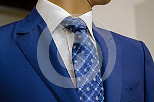 Blue business suit with a white shirt and with a blue tie in drawing