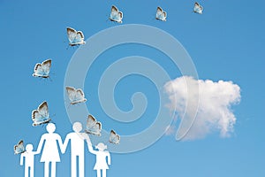 Blue butterflies flying on a family with blue sky background welfare concept