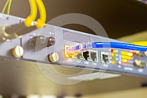 Blue cable network cables connected to switch port concept business connection information internet