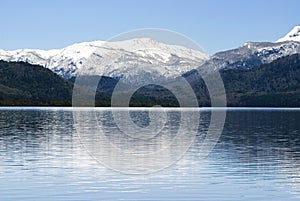 Blue Calm Lake and Snow Covered Mountain