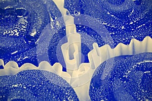 Blue candies in white wrappers