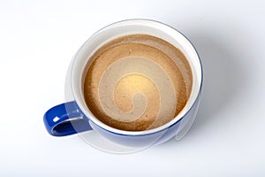 A blue cappuccino isolated at the white background. A coffee cup