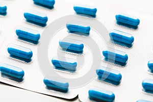 Blue capsule pills blister pack