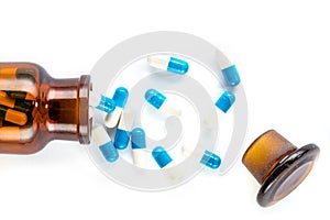 Blue capsules with bottle, healthcare and medicine