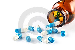Blue capsules with bottle, healthcare and medicine
