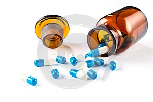 Blue capsules with bottle, healthcare and medicine