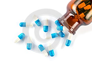 Blue capsules with bottle, healthcare and medicine