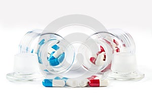 Blue capsules and red capsules with Transparent bottle