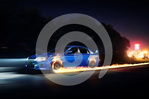 Blue car drive on asphalt countryside road with fire wheels at night