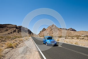 Blue Car on highway