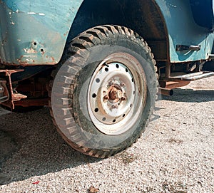 Blue car old black wheel