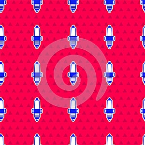 Blue Car spark plug icon isolated seamless pattern on red background. Car electric candle. Vector