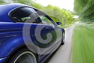 Blue Car Speeding