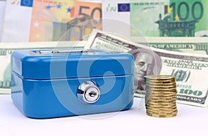 Blue cash box, coins and banknotes background