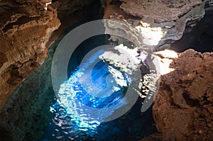 Blue cave with sunray lights photo