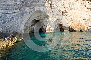 Blue caves at bright sunny day Zakinthos Greece photo