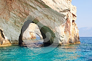 Blue caves at bright sunny day Zakinthos Greece photo