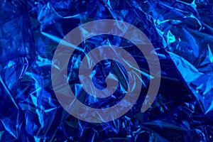 Blue cellophane paper background texture photo