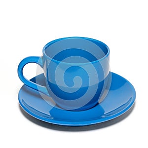 Blue ceramic cup and saucer