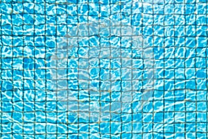 Blue ceramic tile mosaic in swimming pool - seamless texture