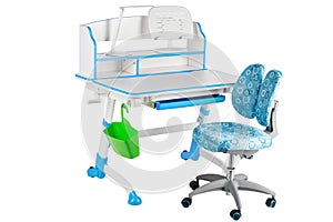 Blue chair, blue school desk, green basket and desk lamp