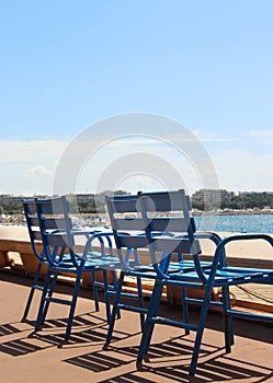 Blue chairs of Cannes, France