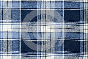 Blue checkered fabric close-up. Texture