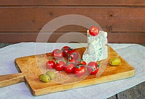 Blue cheese, cherry tomatoes and olives