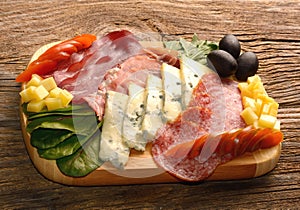 Blue cheese and cold meat platter photo