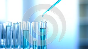 Blue chemical liquid dripping in lab tubes, cleaning agent testing experiment