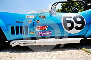 A blue Chevrolet Corvette Stingray SCCA / IMSA (detail) takes part to the Nave Caino Sant'Eusebio race