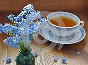 Blue china tea cup with forget me nots