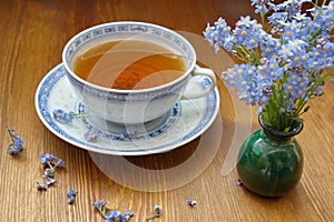 Blue china tea cup with forget me nots