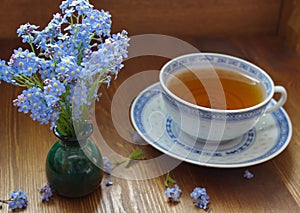 Blue china tea cup with forget me nots