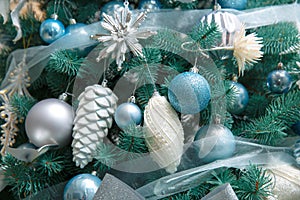 Blue christmas ball on a spruce