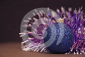 Blue Christmas balls with a garland. Holidays and New Year.