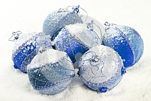 Blue christmas balls with snow