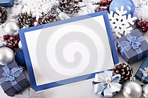 Blue Christmas card background with decorations and copy space