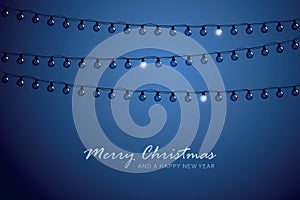 blue christmas greeting card with one shining fairy light bulb