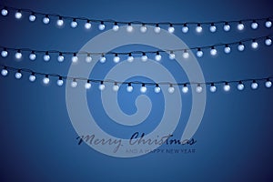 blue christmas greeting card with shiny fairy lights