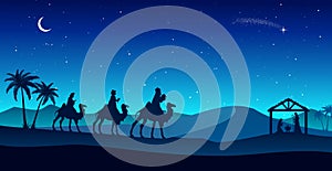 Blue Christmas Nativity Scene: Three Wise Men go to the manger in the desert at night.