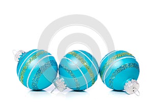 Blue Christmas Ornaments on white background with copy space