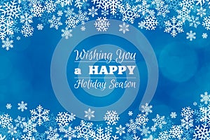 Blue Christmas winter background with greeting text and frame of snowflakes