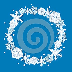 Blue Christmas winter background with snowflakes wreath