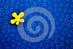 Blue circles background and irregular yellow shape